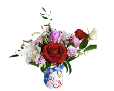 Love in Bloom - Celebrate the special people in your life with this elegant arrangement, beautifully presented in a handcrafted designer vase from the Bird of Paradise collection by Beatrice Migneco from BDesign. The vase, measuring 9x11cm, features a vibrant and artistic design that adds a unique touch to any space.
