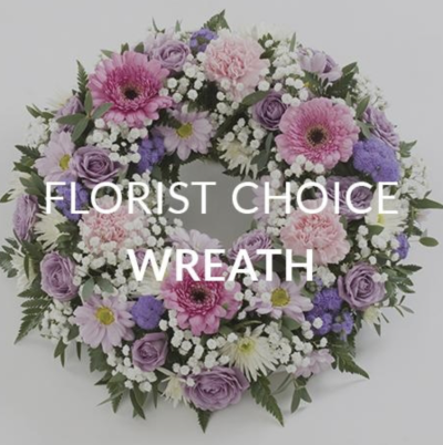 Florist Choice Wreathe - Our Florist’s Choice Funeral Wreath is a beautiful and heartfelt tribute, carefully arranged by our skilled florists using the freshest seasonal flowers. Designed to honor the memory of a loved one, this wreath serves as a symbol of love, respect, and remembrance during a difficult time.
