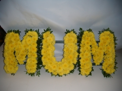 3 letters - MUM or DAD. - MUM or DAD made out of flowers to show your appreciation for that special parent. Forms for other names are not readily available and we would suggest you see the wreath with the graphic print in the middle.