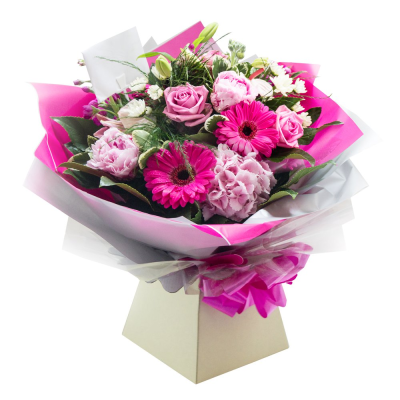 Cherry Blossom - The Cherry Blossom Bouquet is a stunning hand tied bouquet that radiates beauty, grace, and charm. Featuring an elegant mix of soft pink roses, vibrant gerbera daisies, and several other pink blooms, this bouquet captures the essence of springtime blooms. Accented with lush green foliage and wrapped in stylish pink and white tones, it creates a perfectly balanced display of color and texture and delivered in a cardboard vase.

Ideal for birthdays, anniversaries, welcoming a new baby or simply to show appreciation, the Cherry Blossom Bouquet brings a touch of cheer and sophistication to any occasion. Its combination of lush, fresh flowers ensures it stands out as a timeless expression of love, admiration, and happiness.

Brighten someone’s day with this exquisite pink arrangement – a beautiful gift for those who appreciate the finer things in life.