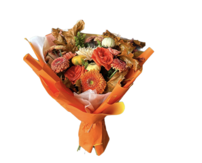 Golden Harvest - A radiant celebration of Autumn's Warmth - featuring rich orange seasonal blooms, rustic dried foliage, and mini ornamental pumpkins.